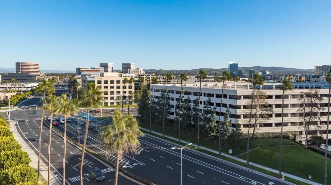 Palm-lined roads and commercial buildings in Irvine, California